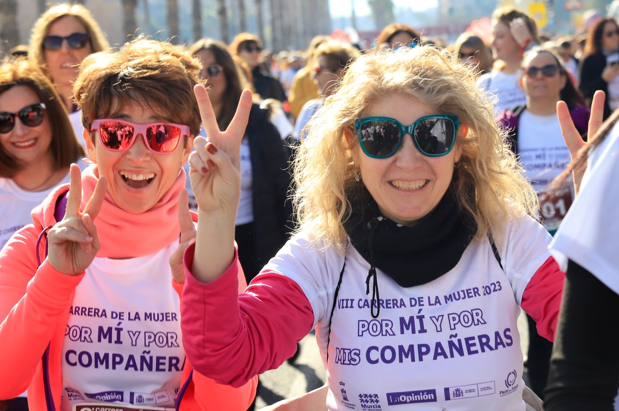 La salida y el recorrido de la Carrera de la Mujer 'inmortalizados' en imágenes