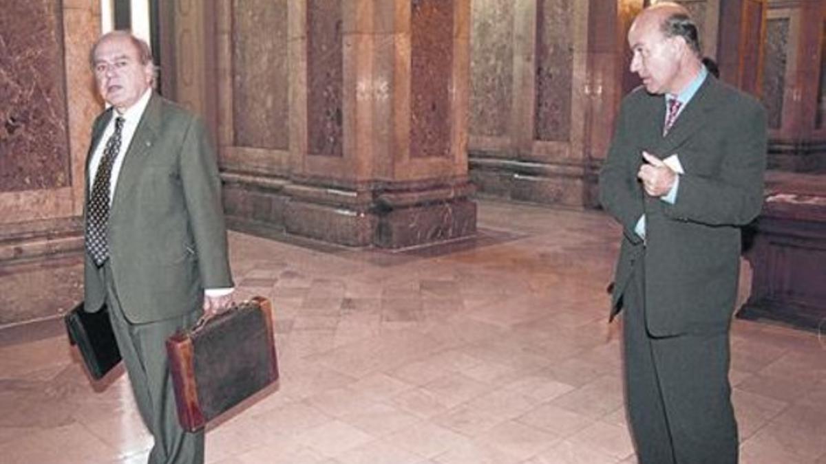 Jordi Pujol y Josep Antoni Duran Lleida, al acabar un pleno del Parlament, en marzo del 2001.