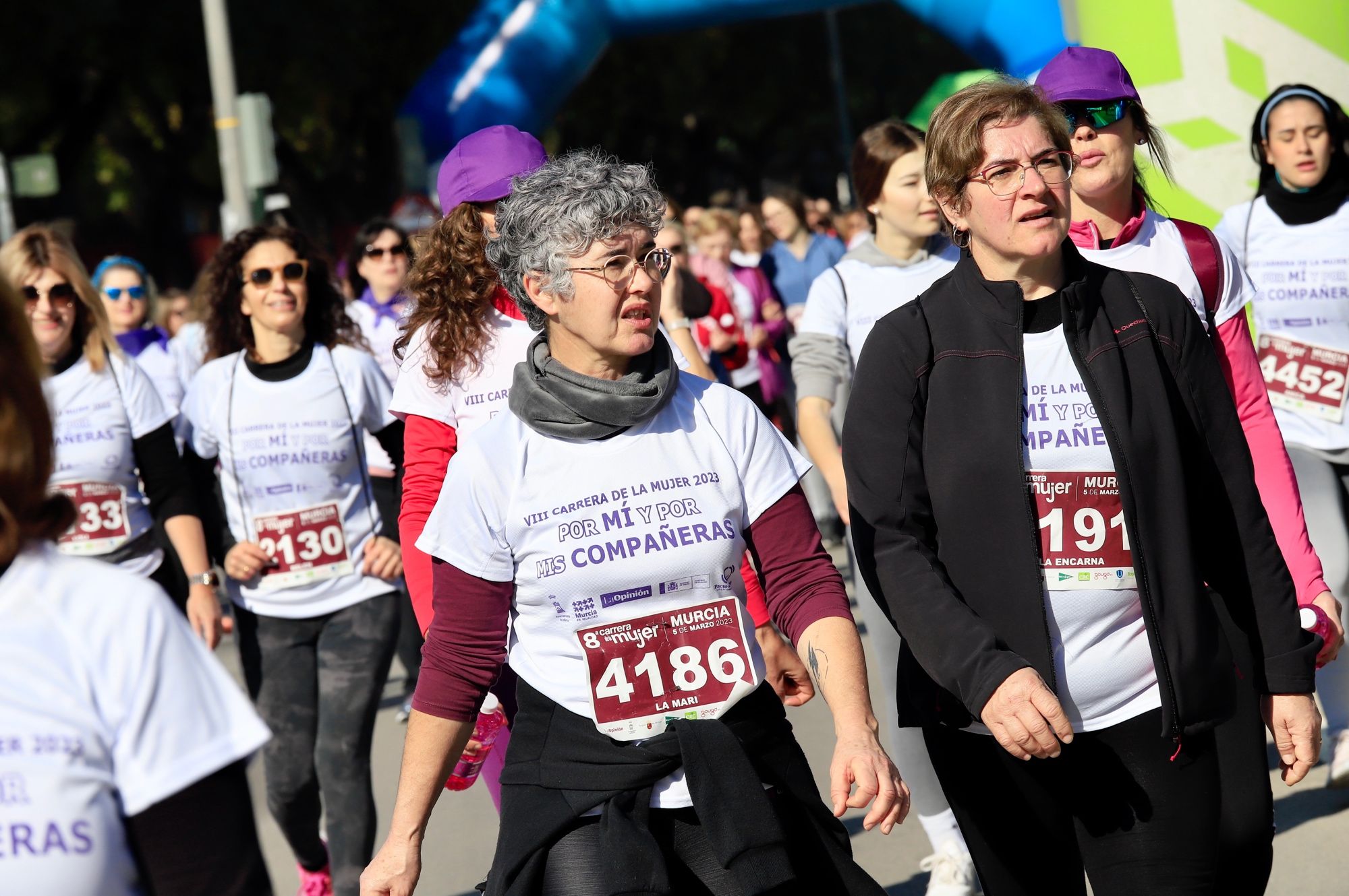 La salida y el recorrido de la Carrera de la Mujer 'inmortalizados' en imágenes