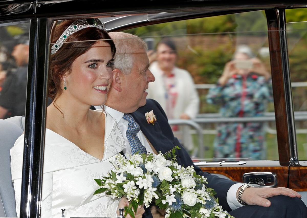 Princess Eugenie is driven towards St George’s Chapel with her father Prince Andrew, Duke of York, for her wedding to Jack Brooksbank at Windsor Castle, Windsor, Britain October 12, 2018. REUTERS/Darren Staples