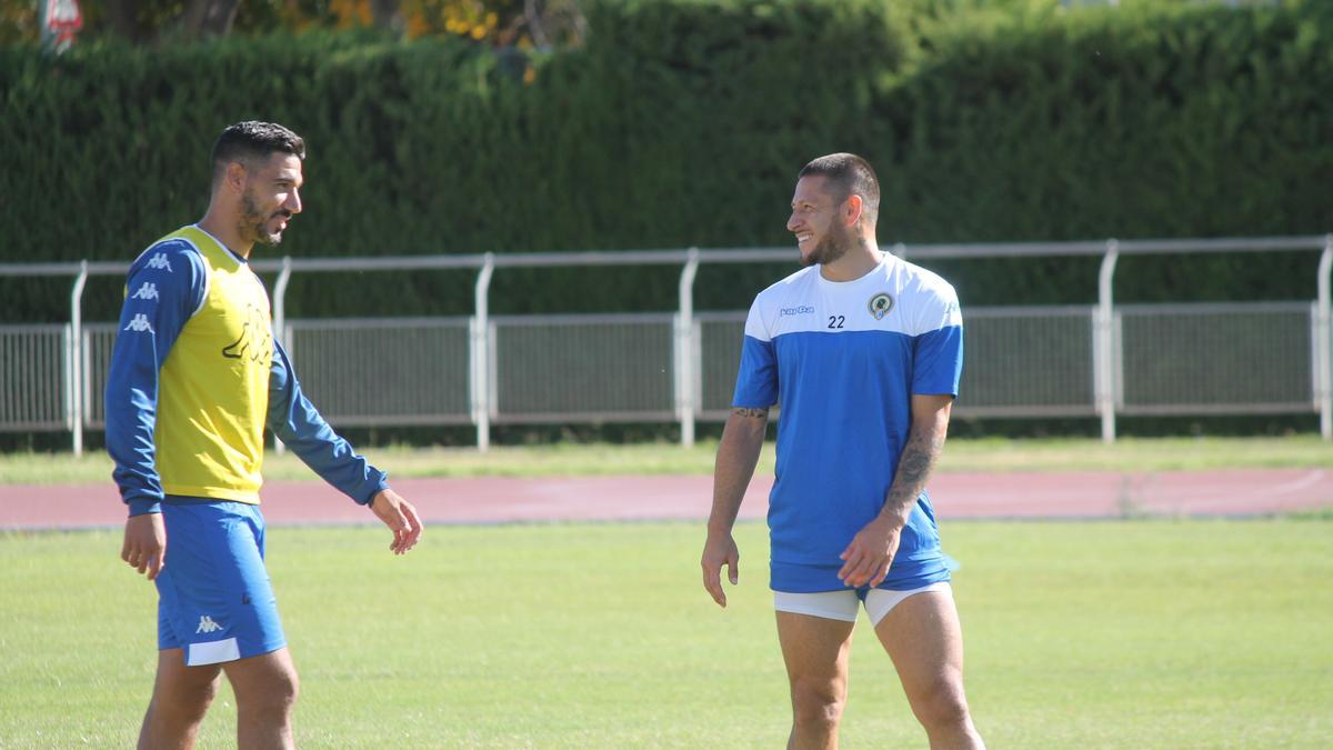 El entrenamiento de ayer. Moisés y Acuña.