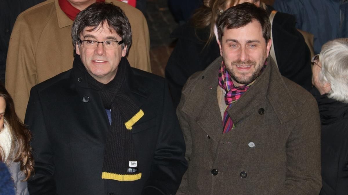 Carles Puigdemont y Toni Comín, en un acto en Lovaina el pasado 6 de febrero.