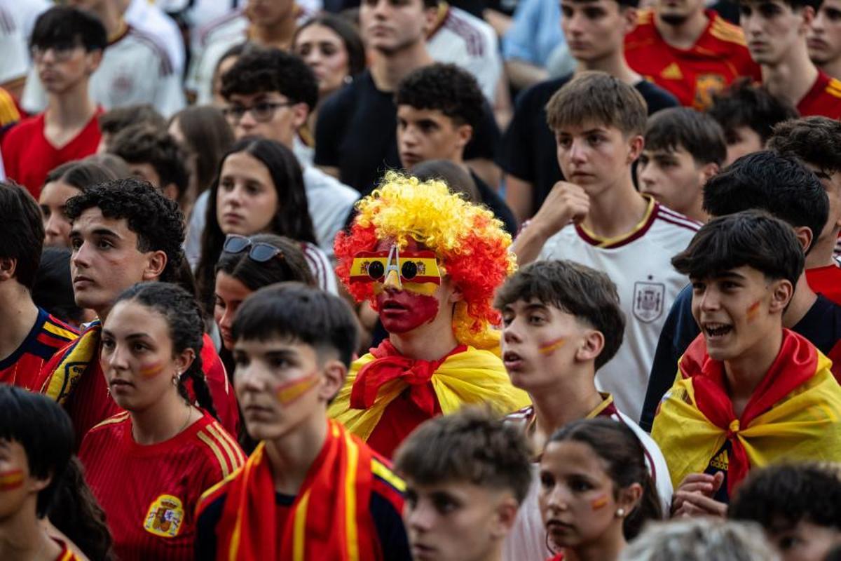 Aficionados, viendo un partido.