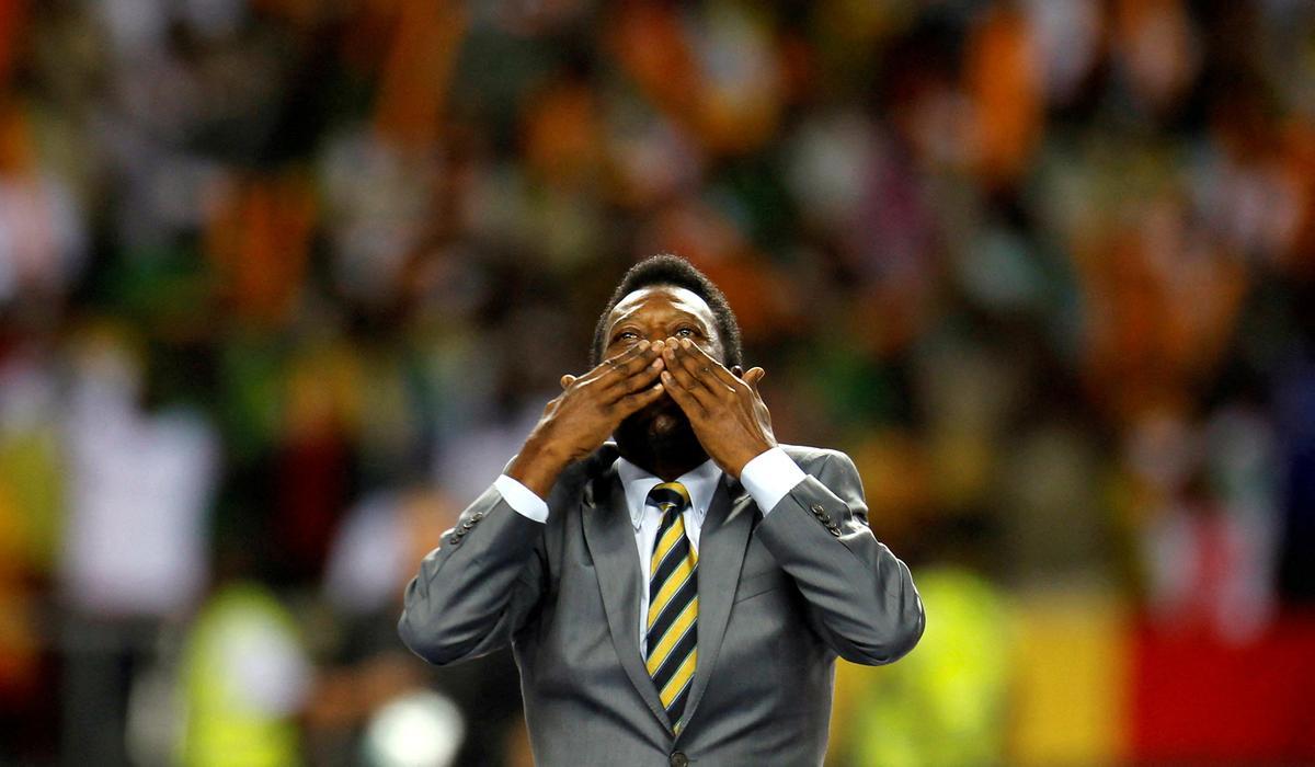 FILE PHOTO: Brazils soccer legend Pele acknowledges the crowd before the 2012 African Cup of Nations semi-final soccer match between Ivory Coast and Mali in Libreville