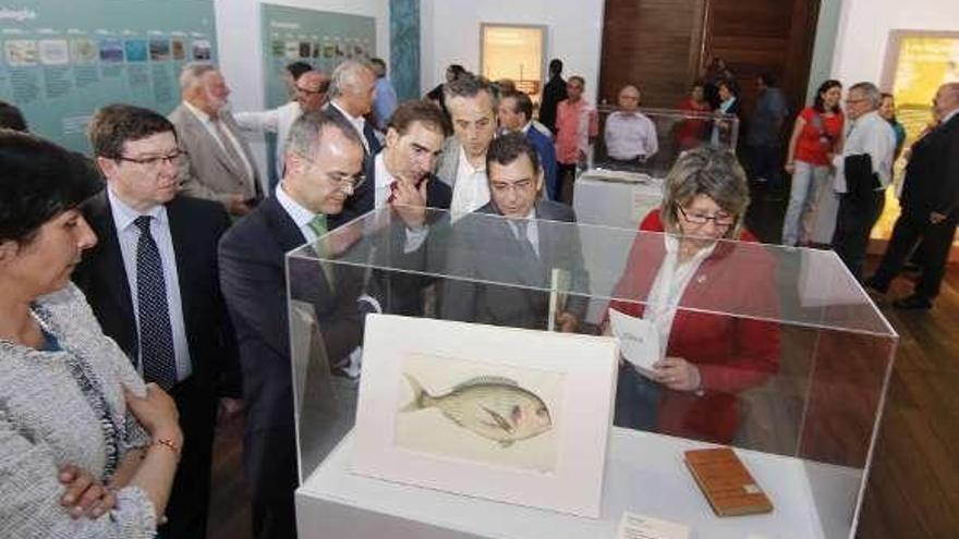 Los conselleiros de Cultura y Mar, durante la apertura de la muestra.