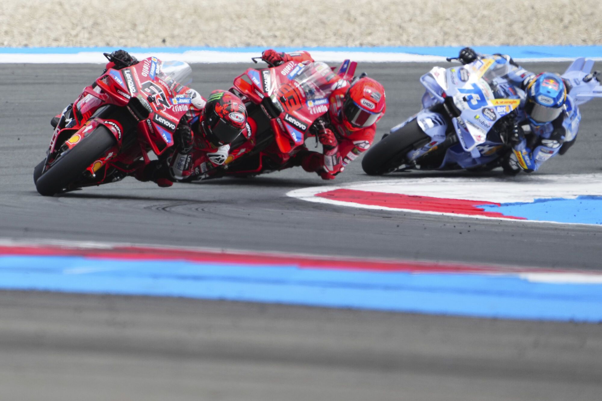 Italian rider Francesco Bagnaia of the Ducati Lenovo Team steers his motorcycle followed by Spain's rider Marc Marquez of the Ducati Lenovo Team AND Spain's rider Alex Marquez of the BK8 Gresini Racing MotoGP during the MotoGP race at the Grand Prix of the Netherlands at the TT Circuit in Assen, northern Netherlands, Sunday, June 29, 2025. (AP Photo/Peter Dejong) Associated Press/LaPresse. EDITORIAL USE ONLY/ONLY ITALY AND SPAIN