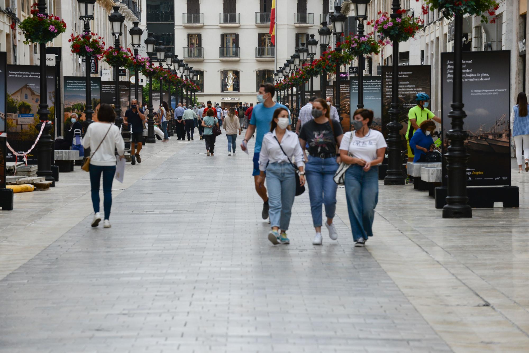 Exposición fotográfica 'Málaga Inspira', en la calle Larios