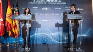 La presidenta de la Comunidad de Madrid, Isabel Díaz Ayuso, y el presidente de la Generalitat Valenciana, Carlos Mazón, intervienen en la II Cumbre Empresarial Comunidad de Madrid-Comunidad Valenciana, en el Real Casino de Madrid, a 12 de diciembre de 202