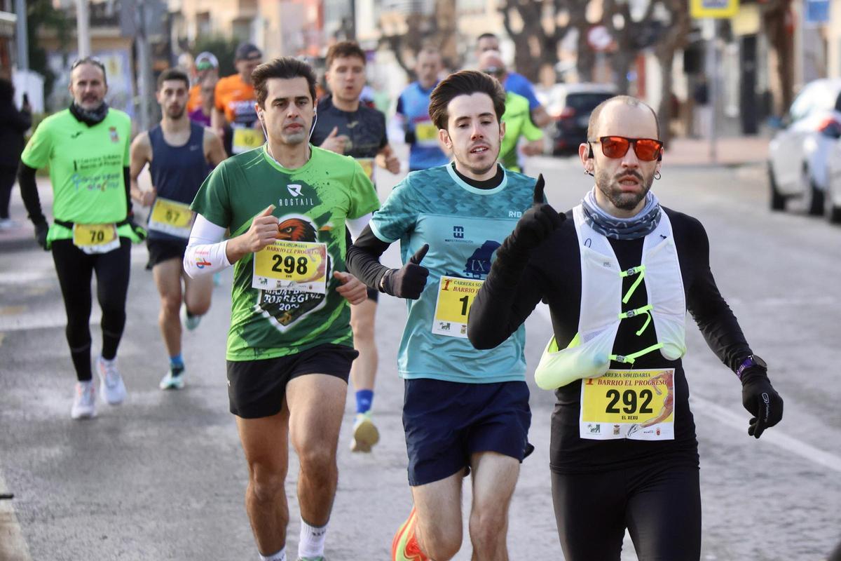 Las imágenes de la carrera popular solidaria en el barrio de El Progreso