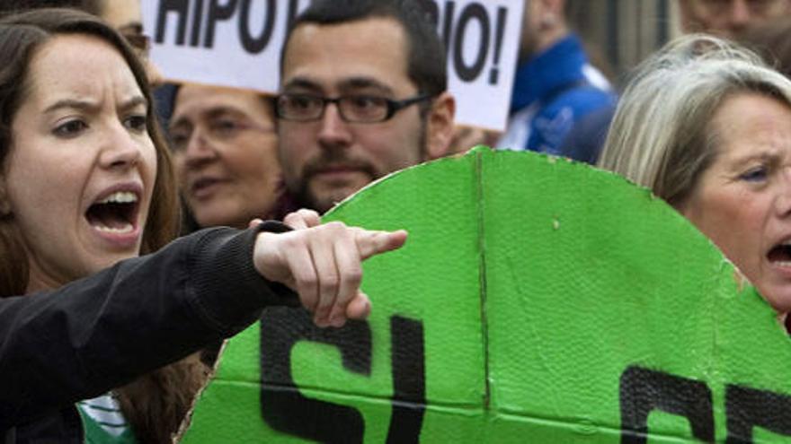 Imagen de un escrache en Sevilla.