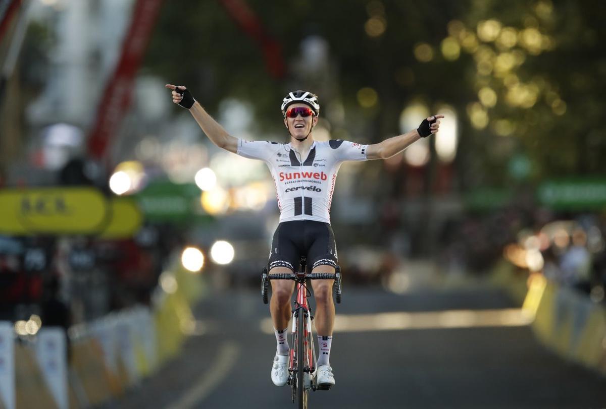 Cycling - Tour de France - Stage 14 - Clermont-Ferrand to Lyon - France - September 12, 2020. Team Sunweb rider Soren Kragh Andersen of Denmark  crosses the finish line REUTERS/Stephane Mahe