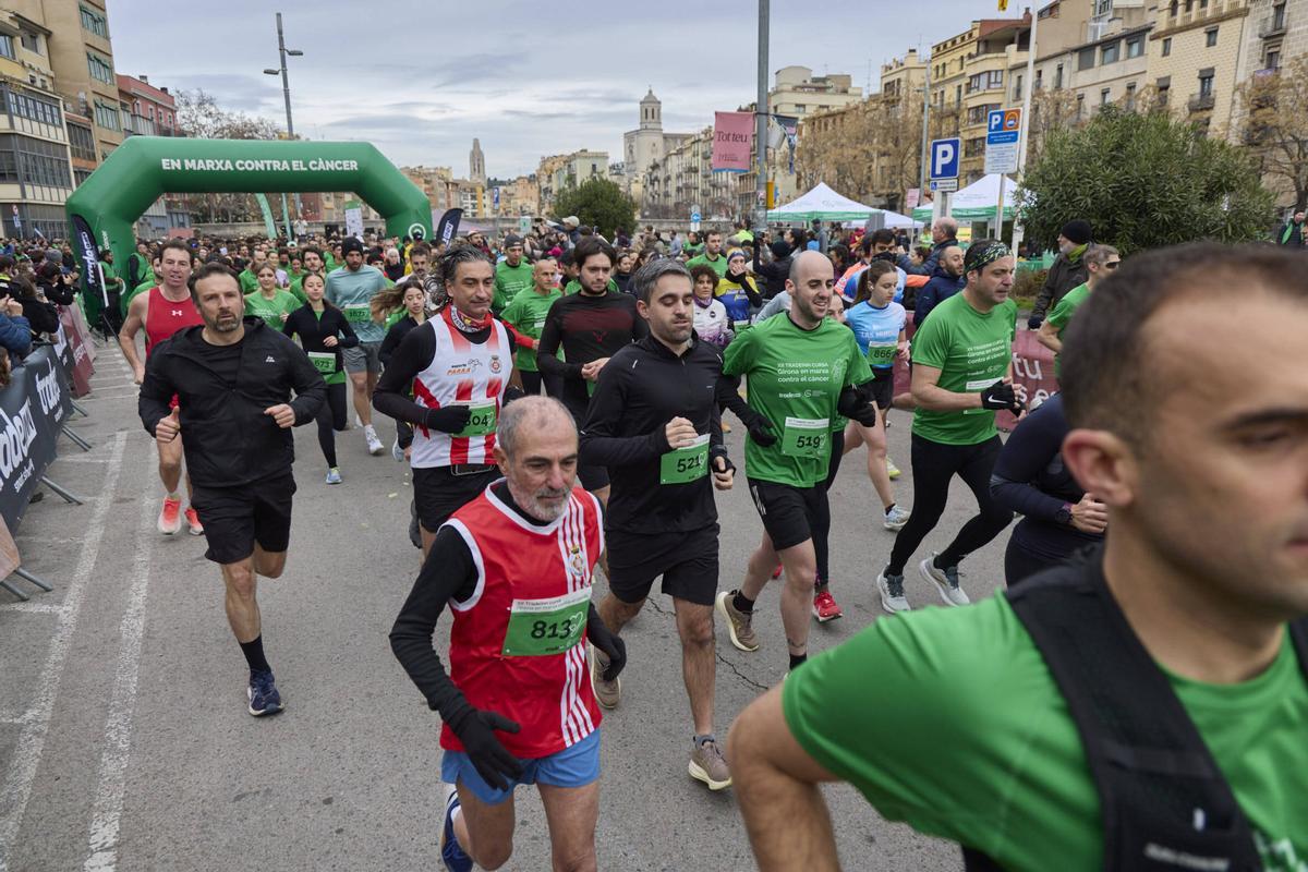La XII Tradeinn Cursa Girona en Marxa Contra el Càncer en imatges