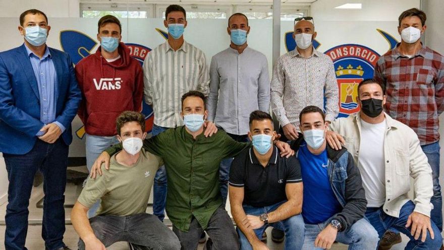 The ten new firefighters join the Consortium