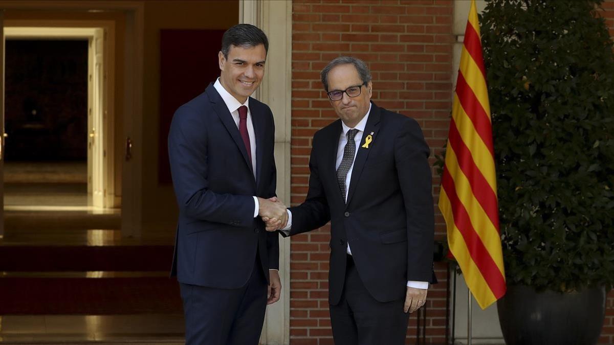 El presidente del Gobierno, Pedro Sánchez, y el jefe del Govern, Quim Torra, en la Moncloa, el pasado 9 de julio.