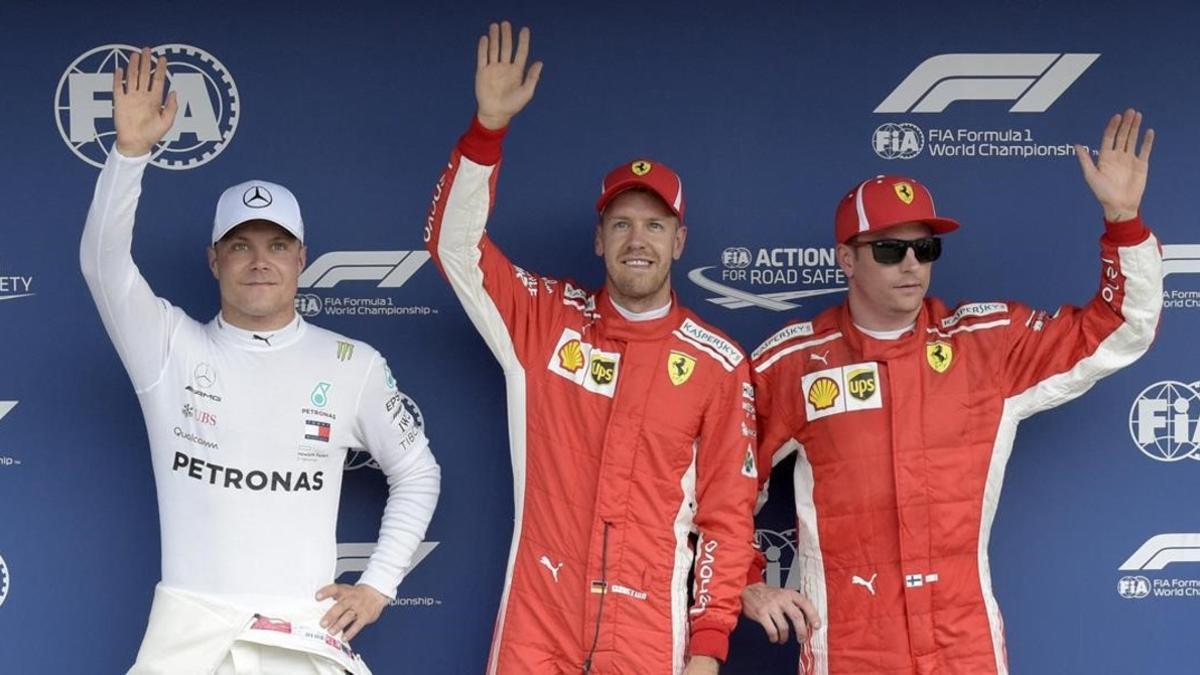 Valtteri Bottas (2º), Sebastian Vettel (1º) y Kimi Raikkonen (3º), después de marcar la pole del GP de Alemania.