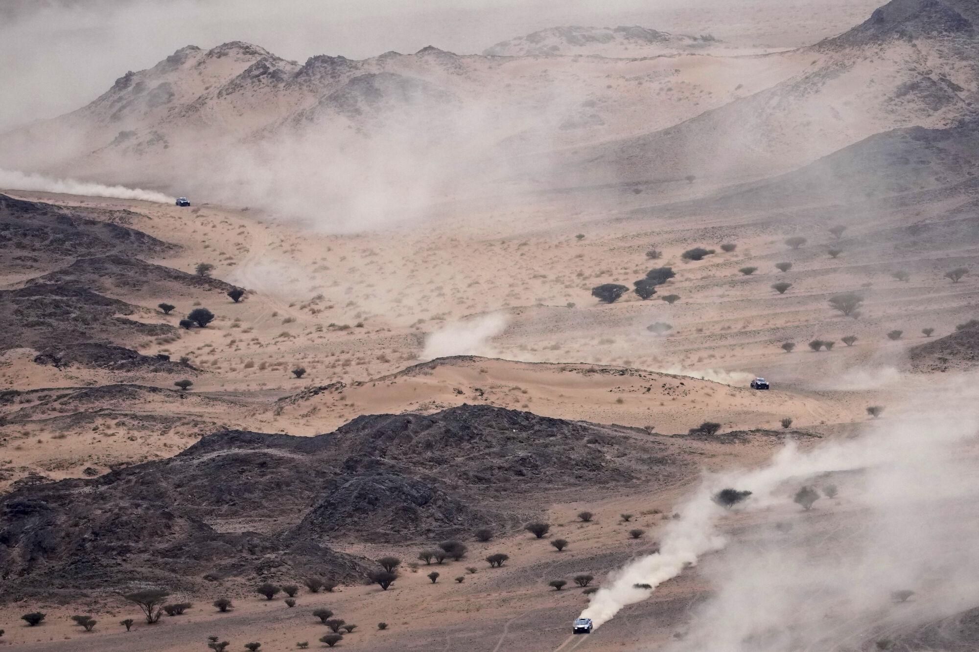 Cars drive during the seventh stage of the Dakar Rally with start and finish in Al Duwadimi, Saudi Arabia, Sunday, Jan. 12, 2025. (AP Photo/Christophe Ena). EDITORIAL USE ONLY/ONLY ITALY AND SPAIN
