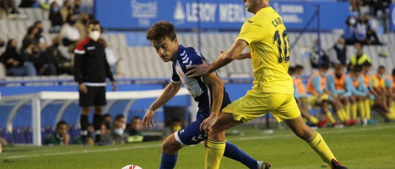 Joseba Muguruza (Sabadell) y Carlo Adriano (Villarreal B).