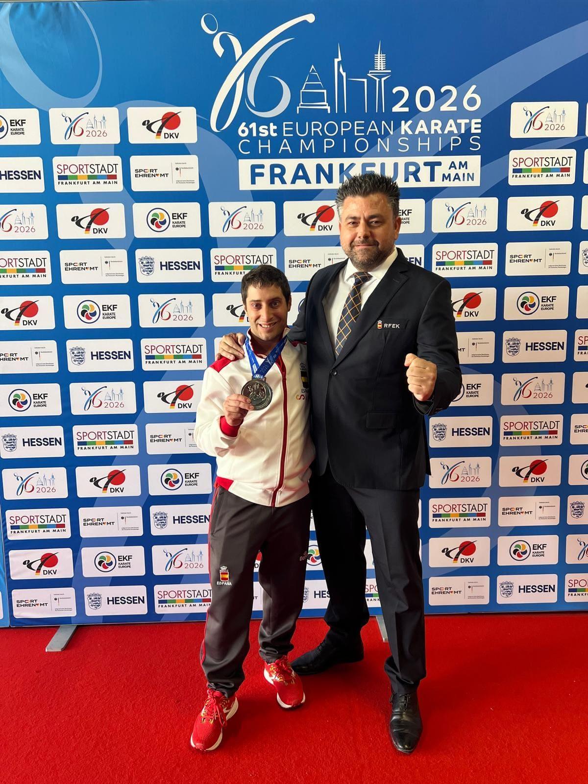 Carlos Huertas y su entrenador Antonio Miguel Verdú.
