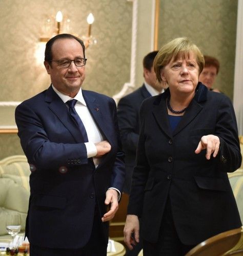 Angela Merkel and Francois Hollande attend a meeting on resolving the Ukrainian crisis in Minsk