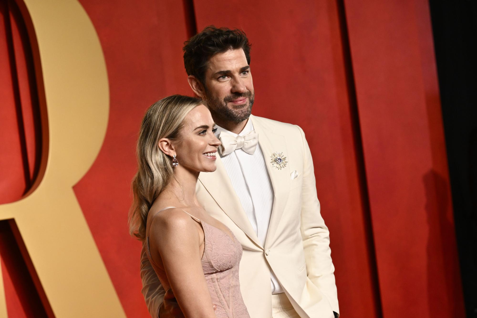 Emily Blunt, left, and John Krasinski arrive at the Vanity Fair Oscar Party on Sunday, March 10, 2024, at the Wallis Annenberg Center for the Performing Arts in Beverly Hills, Calif. (Photo by Evan Agostini/Invision/AP) / 031024130199, 21334631,
