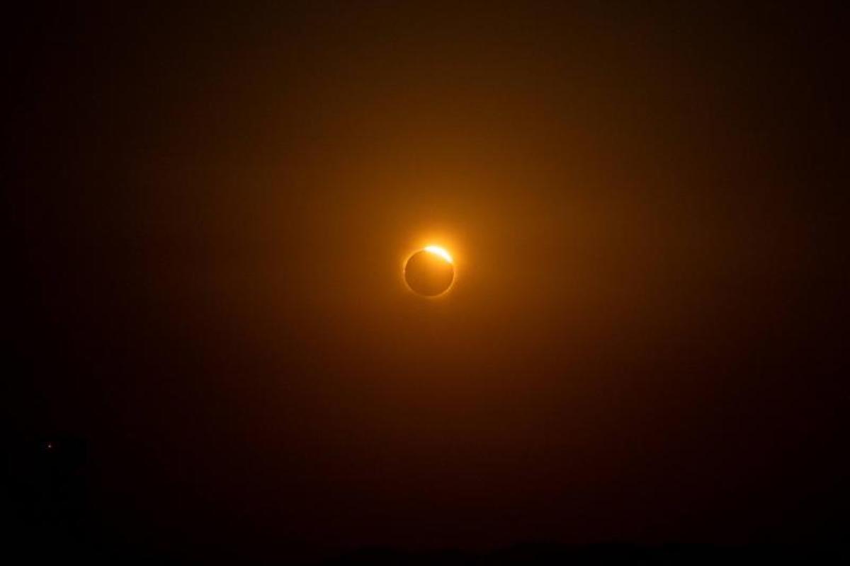 Imagenes del Eclipse solar visto desde el Castillo de Montjuic.
