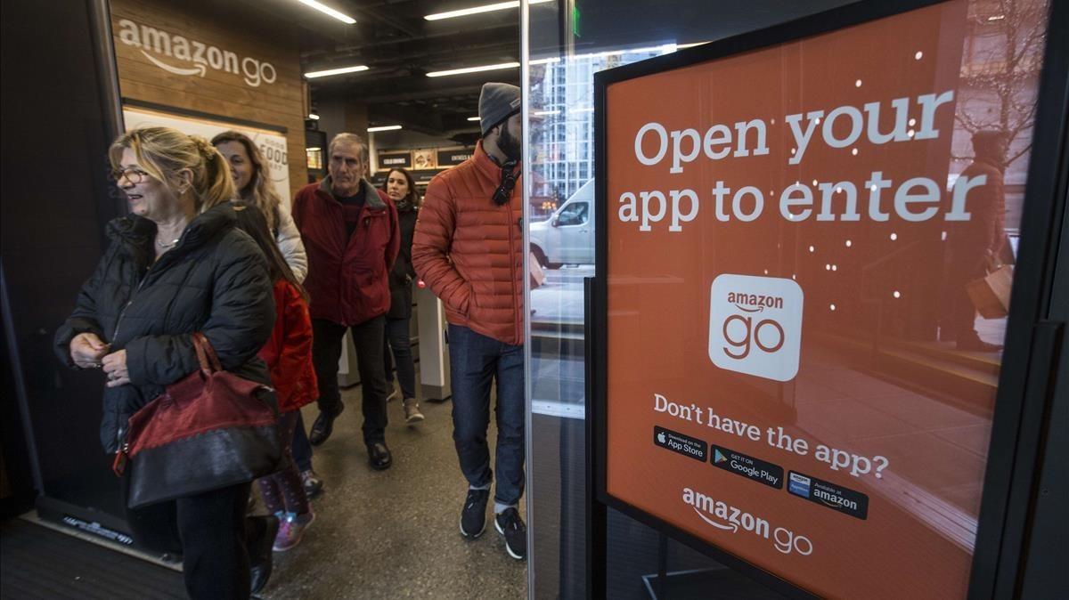 undefined41737038 seattle  wa   january 22  shoppers leave the amazon go store180126112325