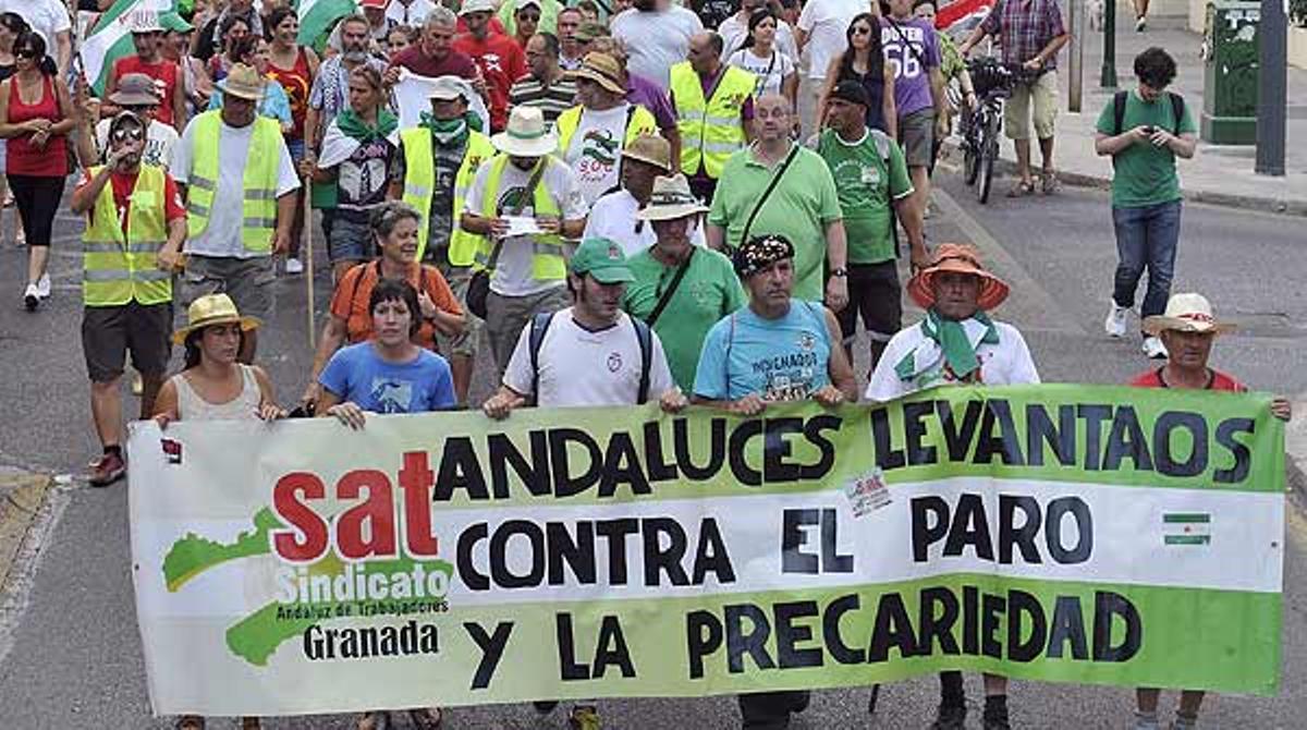 Membres del SAT ocupen una sucursal bancària a Màlaga.