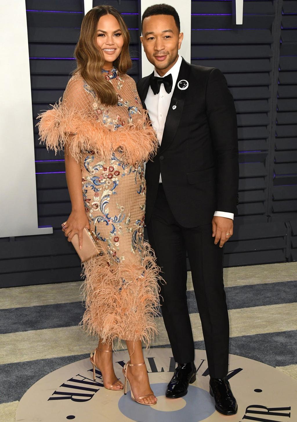 Chrissy Teigen y John Legend en los Oscar