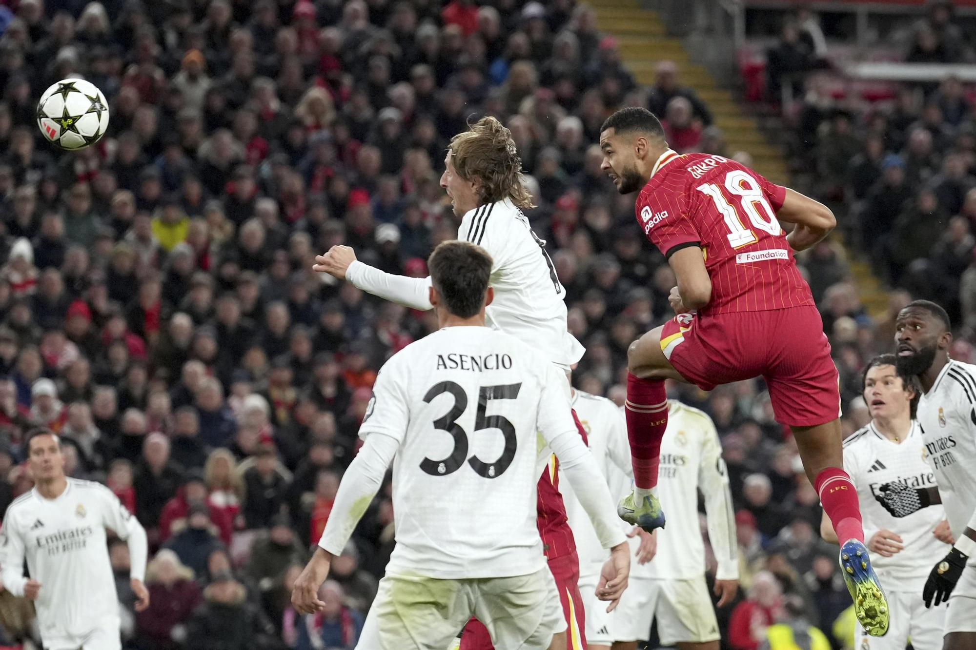 Liverpool's Cody Gakpo, center right, scores his side's second goal during the Champions League opening phase soccer match between Liverpool and Real Madrid at Anfield Stadium, Liverpool, England, Wednesday, Nov. 27, 2024. (AP Photo/Jon Super)