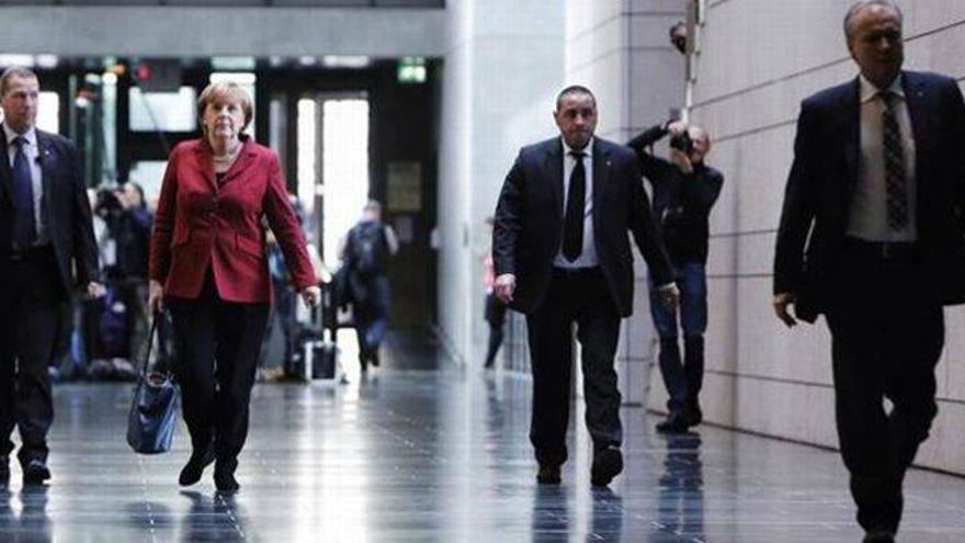 Merkel y los socialdemócratas a un paso de gobernar en coalición