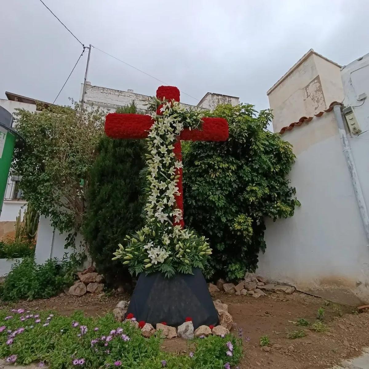 La cruz del tercer premio.