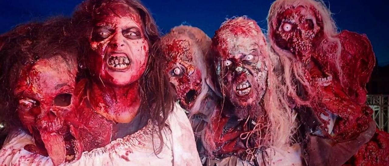 Eva Pérez y Adrián Cardona se maquillaron uno al otro como zombies para el concurso celebrado en Sitges.