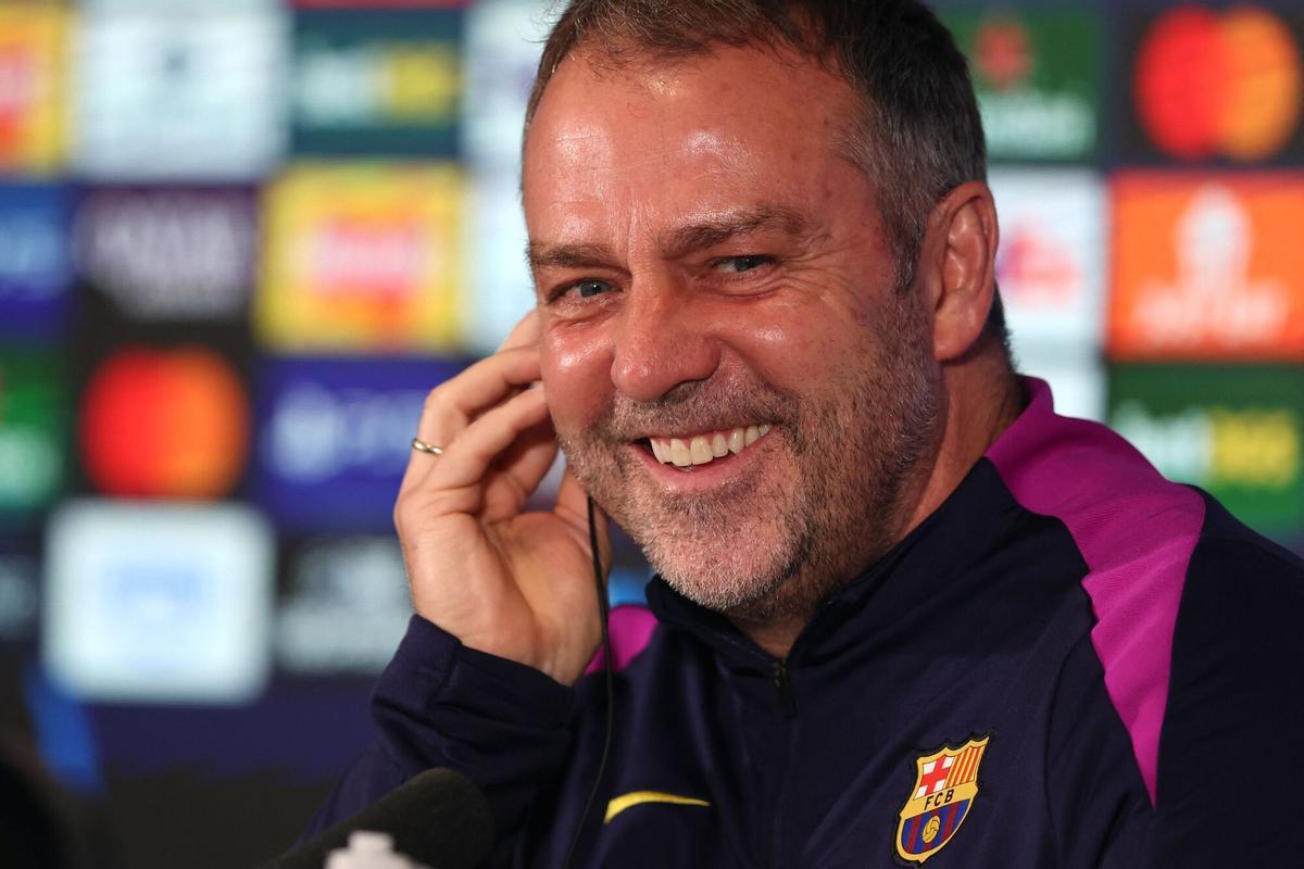 Barcelona's German coach Hans-Dieter Flick attends a press conference at St James' Park in Newcastle upon Tyne, on March 9, 2026, the eve of their UEFA Champions League Last 16 football match against Newcastle United. (Photo by SCOTT HEPPELL / AFP)