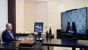 Russian President VladimirA Putin takes part in a video conference call with Mayor of Moscow Sergei Sobyanin  amid the coronavirus disease (COVID-19) outbreak  at the Novo-Ogaryovo state residence outside Moscow  Russia May 27  2020  Sputnik Alexei Nikolsky Kremlin via REUTERS ATTENTION EDITORS - THIS IMAGE WAS PROVIDED BY A THIRD PARTY