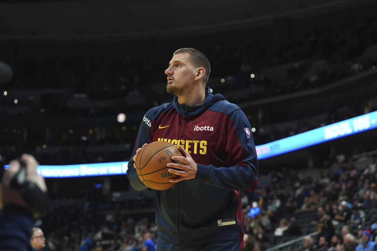 Denver Nuggets center Nikola Jokic (15) in the first half of an Emirates NBA Cup basketball game Tuesday, Dec. 3, 2024, in Denver. (AP Photo/David Zalubowski)