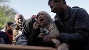 Palestinians mourn their dead as Israel continues to strike Gaza