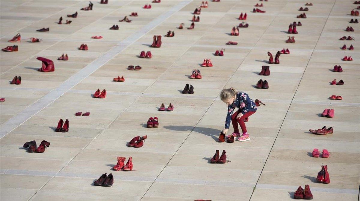 monmartinez46135323 a display of hundreds of red shoes spread as protest against181204123437