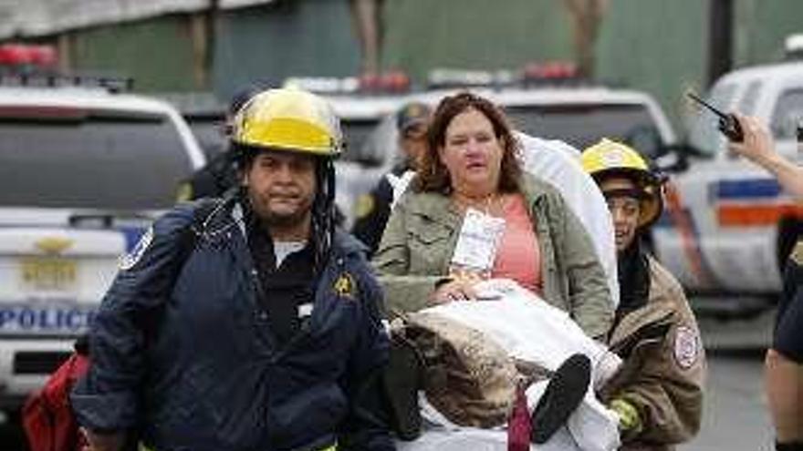 Una mujer herida. // Efe