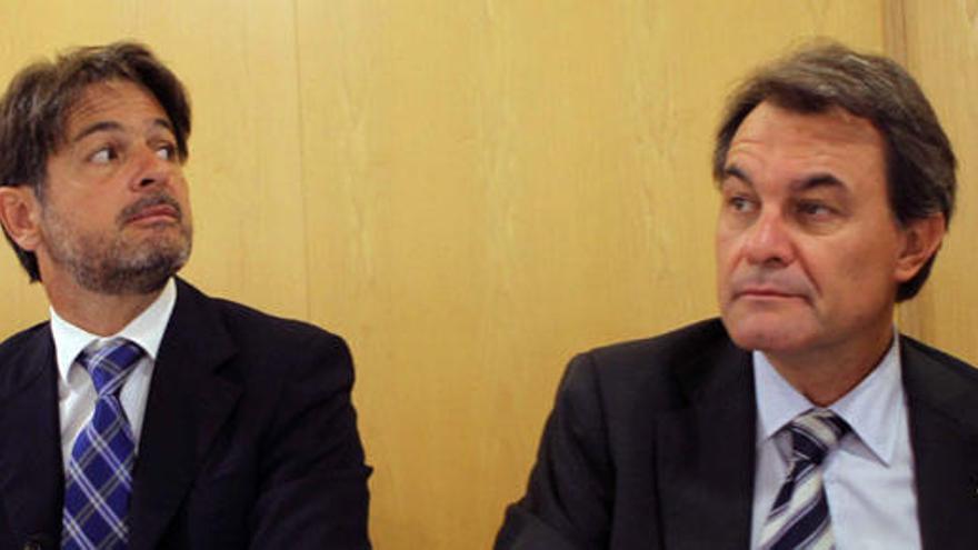 Artur Mas junto el secretario general de CDC, Oriol Pujol.