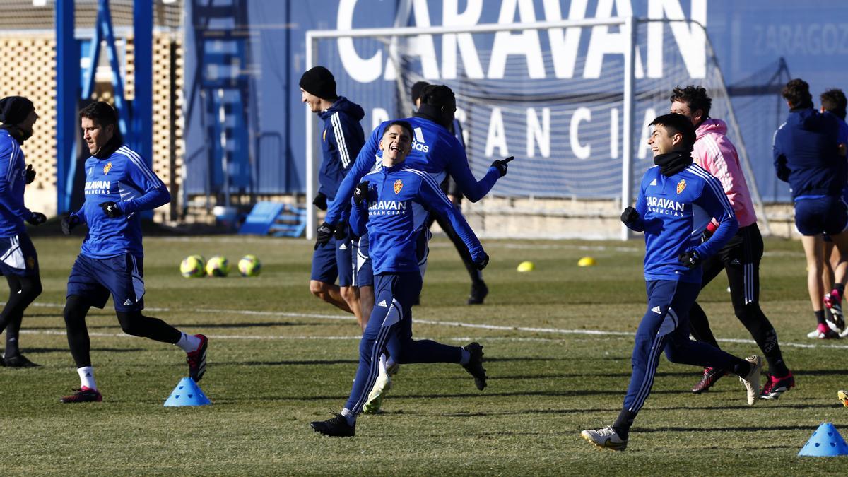 Zapater, Bermejo y Alarcón, en un esprint durante un entrenamiento en la Ciudad Deportiva.