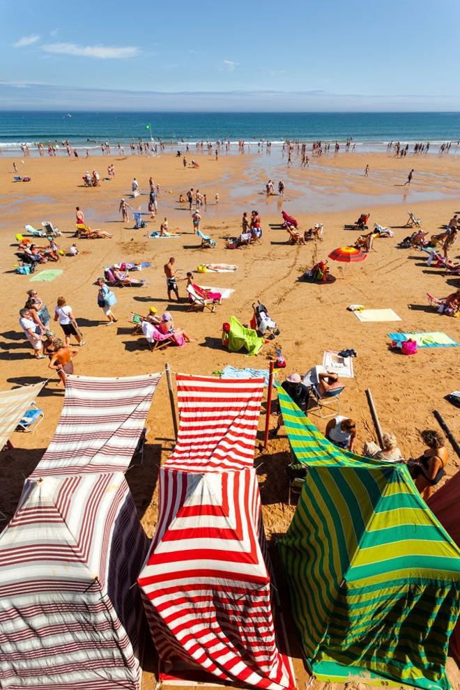 Casetas en la playa de San Lorenzo de Xixón