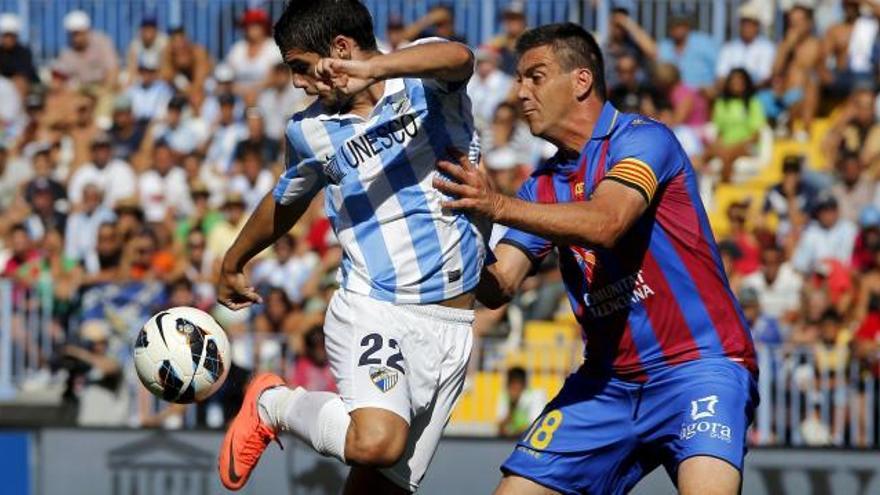 Ballesteros trata de frenar a Isco en la Rosaleda