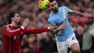 LIVERPOOL (United Kingdom), 08/02/2026.- Rayan Ait-Nouri of Manchester City (R) in action against Dominik Szoboszlai of Liverpool (L) during the English Premier League match between Liverpool FC and Manchester City, in Liverpool, Britain, 08 February 2026. (Reino Unido) EFE/EPA/ADAM VAUGHAN EDITORIAL USE ONLY. No use with unauthorized audio, video, data, fixture lists, club/league logos, live services or NFTs. Online in-match use limited to 120 images, no video emulation. No use in betting, games or single club/league/player publications