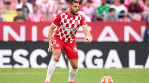 GIRONA, SPAIN - MAY 10: David Lopez of Girona FC runs with the ball during the LaLiga match between Girona FC and Villarreal CF at Montilivi Stadium on May 10, 2025 in Girona, Spain. (Photo by Alex Caparros/Getty Images)