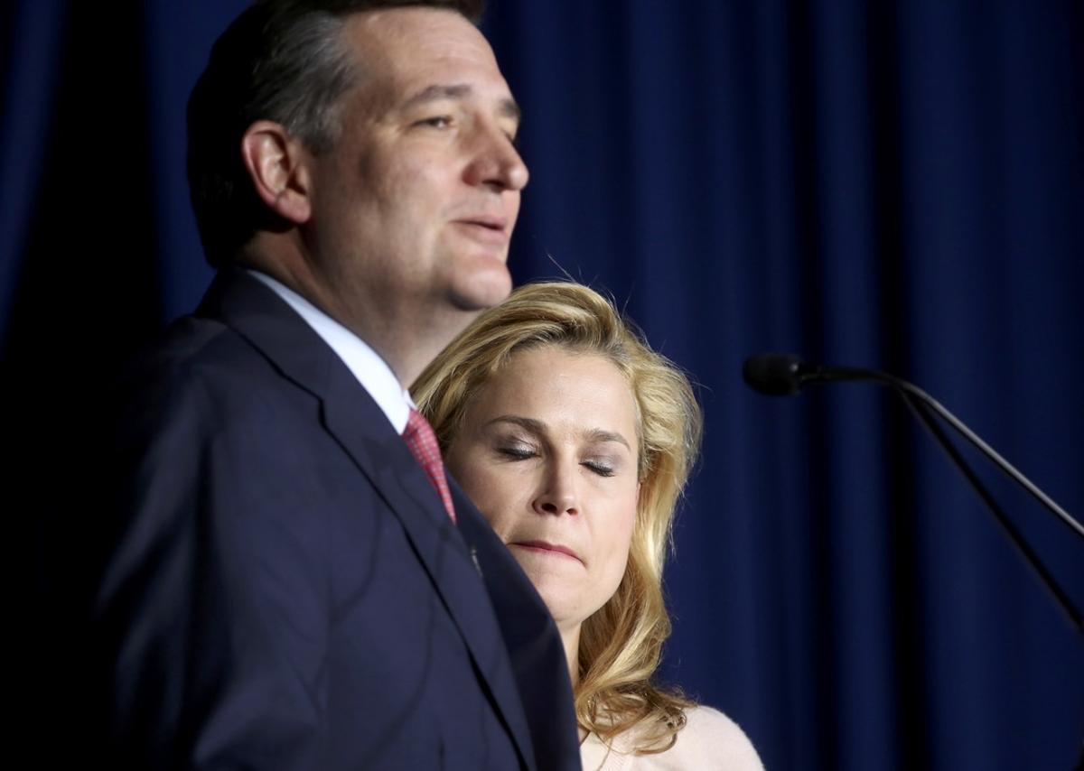 Heidi Cruz, wife of Republican U.S. presidential candidate Senator Ted Cruz, bites her lip and closes her eyes as she listens to her husband drop out of the race for the 2016 Republican presidential nomination during his Indiana primary night rally in Indianapolis, Indiana, U.S., May 3, 2016.    REUTERS/Chris Bergin