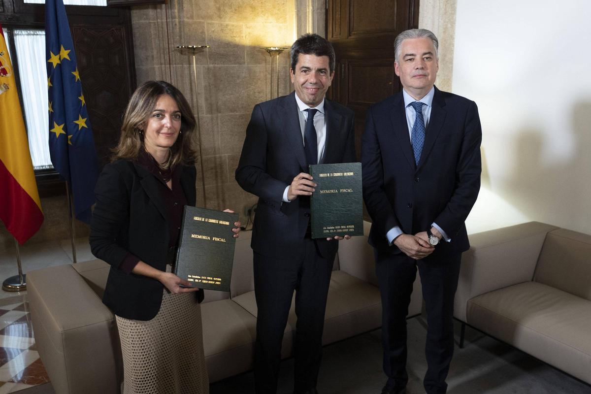 La actual consellera de Justicia, Nuria Martínez Sanchis, el expresidente de la Generalitat, Carlos Mazón y el Fiscal Superior de la Comunitat Valenciana, José Francisco Ortiz Navarro, en la entrega de la memoria de la Fiscalía.