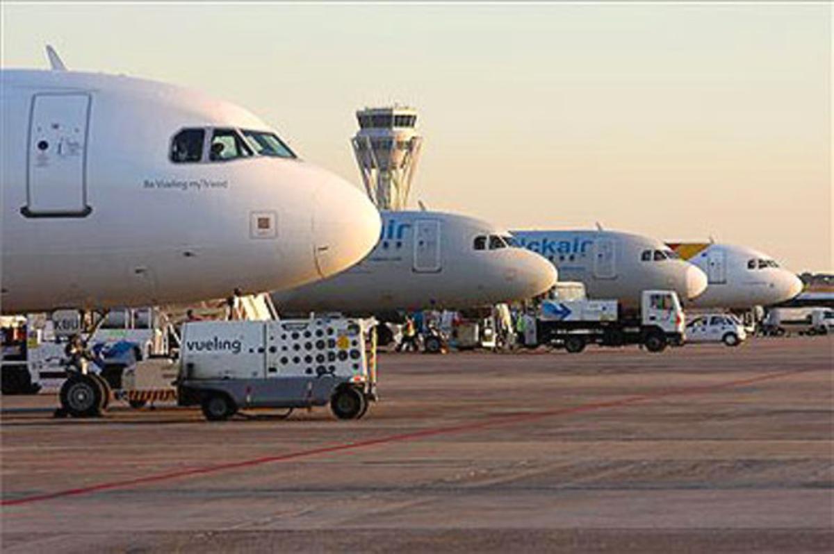 Avions de Vueling, Clickair i Iberia, al Prat. Avions de Vueling, Clickair i Iberia, al Prat.