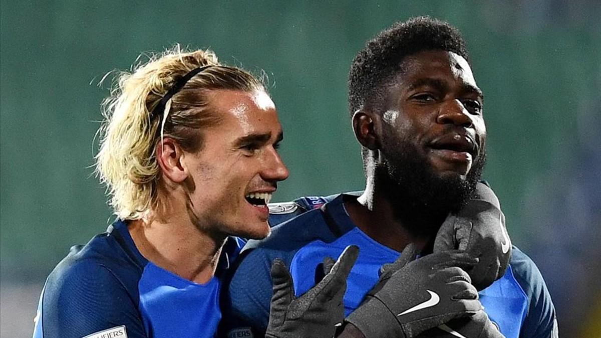 Umtiti junto a Griezmann