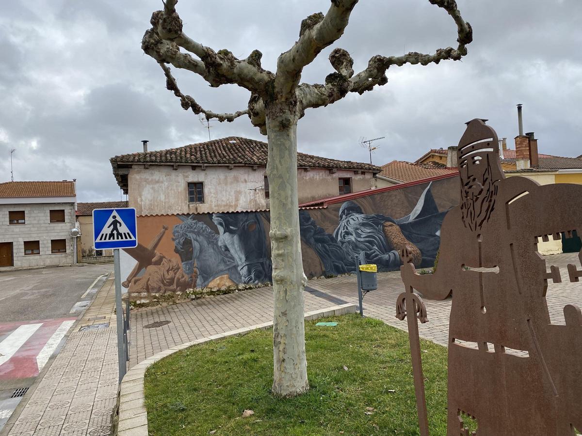 Escultura y mural dedicado al Mio Cid en el centro de Cardeñajimeno.