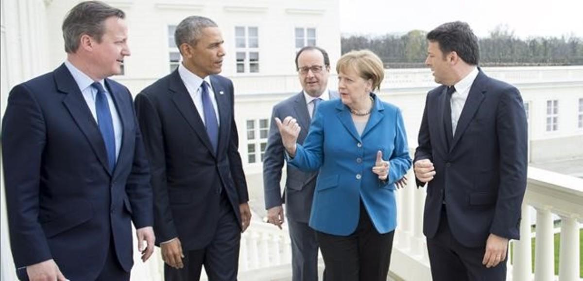 zentauroepp33665866 german chancellor angela merkel  2nd r  stands with british 161205091421